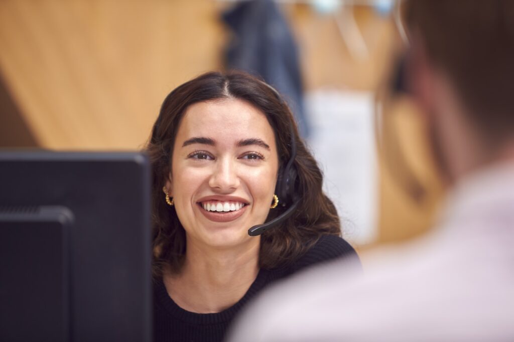 customer support representative talking to a customer