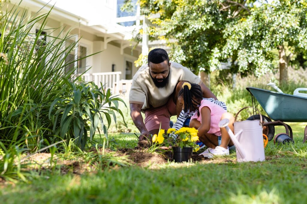 father and daughter landscaping