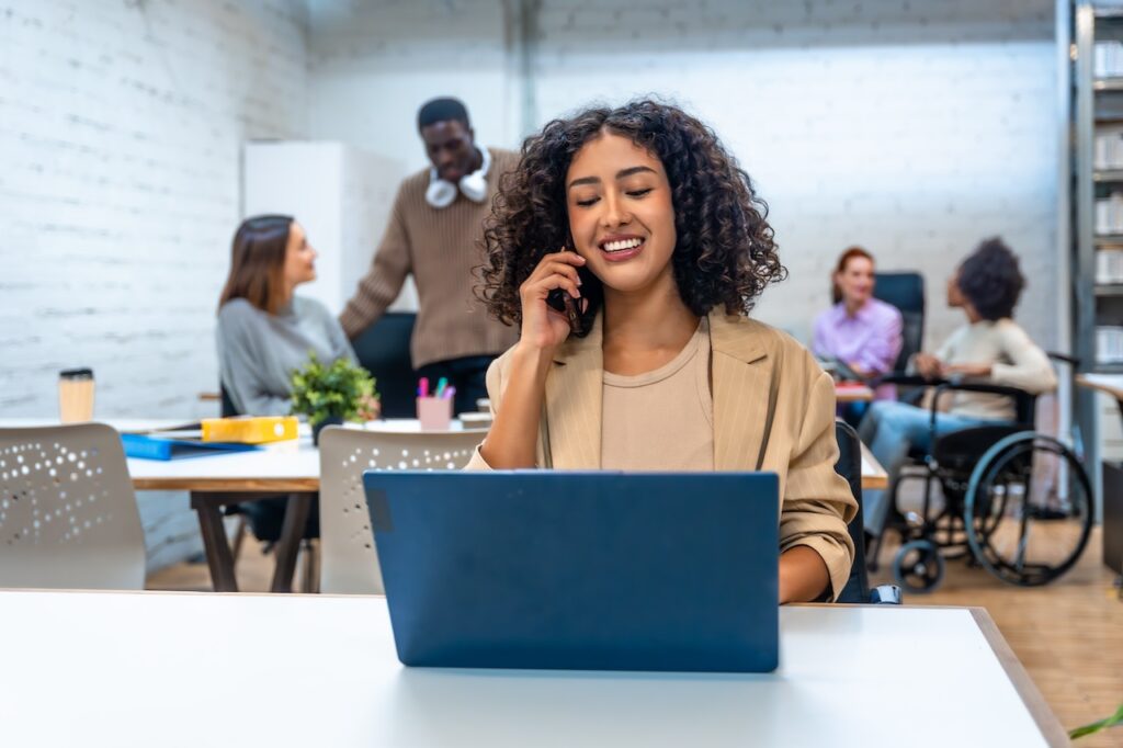 woman in office cold calling